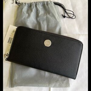Jessica Moore black wristlet, brand new in a dust bag, 8 x 4.25 in. Handle 6 in.